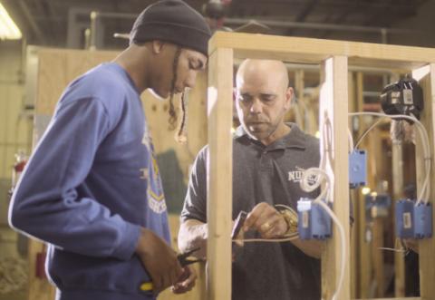 Nunez Community College Instructor, Steve Baiamonte, teaches a student in Electrical Construction, a program in which Nunez o ers three di erent certi. cates and degrees. Electrical, construction, and HVAC trainings will all be enhanced at Nunez with the $1 million Gable Grant award from the Lowe's Foundation.