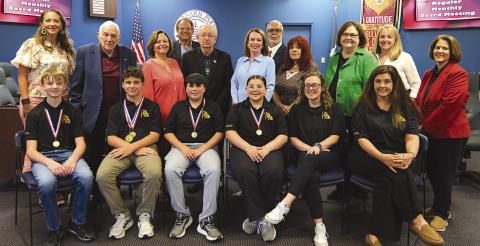 Elementary Division, 1st row from left: Dominick Shreve, Luke Gagnard, Grayson Caballero, Miriam Dali, Christina Crego, Melinda Hall; 2nd row from left: Millie Harris, Don Campbell, Diana Dysart, Joseph Long, Katherine Lemoine, Rosiland White, Doris Voitier, Carly Creason, Mary Lumetta; 3rd row: Sean Warner and Henry Rodriguez III.