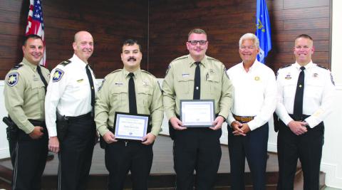 St. Bernard Sheri's Oce Dep. Trevor Lane and Dep. Chase Richard, both assigned to the Corrections Division at the St. Bernard Parish Prison, received Kiwanis Club of St. Bernard-Arabi Sammie Catalanotto LifeSaver Awards on Tuesday, July 8. At the ceremony are, from left: Lt. Justin Topey, of the Corrections Division; Col. Kevin Sensebe, commander of the Corrections Division; Dep. Lane, Dep. Richard, Sheri James Pohlmann; and Col. Daniel Bostic, commander of the Special Investigations Division.