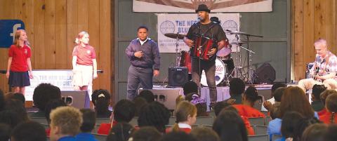 Bruce “Sunpie” Barnes plays the Blues for St. Bernard Parish Public School students.