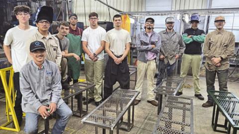 Nunez Welding Summer Internship students show o bike racks and benches they fabricated for St. Bernard Parish parks and trails. Each summer the Welding Summer Internship completes a public service project.