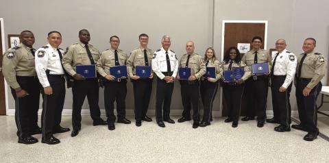 Seven St. Bernard Parish Sheri 's O ce deputies graduated May 5 from the Peace O cers Standards and Training, or P.O.S.T. School at the Slidell Regional Police Academy. At the graduation are, from left: Lt. Donald Johnson, Capt. Leander Morgan, graduates Dep. Derrick Stewart, Dep. Jack Stogner, Dep. Charles Migliore, Sheri James Pohlmann, Dep. Sheldon Prats, Dep. Shelbie Kuylen, Dep. Lytisha Ford, Dep. Anthony Pellerano, Capt. Stephen Ingargiola and Lt. David Culpepper.