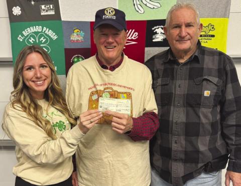 Pictured from left to right are St. Bernard Parish 4-HAgent Gabrielle Guerra, community supporter Michael Chutz, and St. Bernard Parish 4-H Agent Wayne Burgess.
