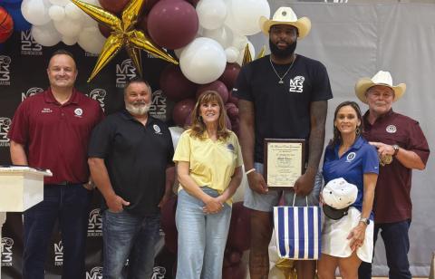 From left: SBPG Council Members Ryan Randall, Fred Everhardt Jr., Patrice Cusimano, New York Knicks Center-Forward Mitchell Robinson, Amanda Mones, and Parish President Louis Pomes.