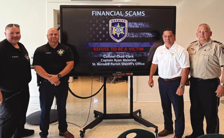 Col. Chad Clark, commander of the St. Bernard Parish Sheri 's O ce Criminal Investigations Bureau, third from left, and Assistant Commander Capt. Ryan Melerine, second from left, speak to members of the Old Arabi Neighborhood Association during a recent community meeting at the Maumus Center, where they share information about current scams targeting residents and how to avoid becoming victims. Also pictured are Detective Lt. Robert Garofalo, far left, and Lt. Eric Eilers, far right.