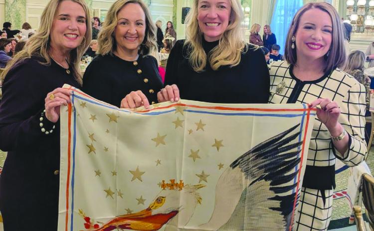 From left: Dr. JanetPopeHebert, theExecutiveDirector of LSBA; Avoyelles Parish School Board President Aimee Dupuy; Hannah Smith Mason, President of Lafayette School Board; and Dr. Katherine Lemoine, 2026 President of the Louisiana School Boards Association, recently joined fellow Louisiana leaders in Washington DC. Mason featured her original artwork as part of Washington Mardi Gras.