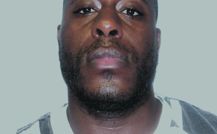 O'Neil Davis, 33, was booked on multiple narcotics and weapons charges following a raid by St. Bernard Parish authorities.