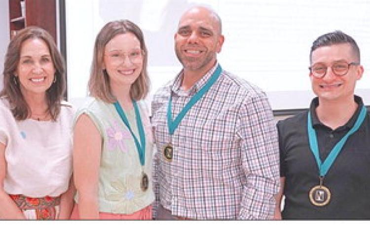 Three of Nunez Community College's top instructors were recognized April 30 during the college's annual Excellence In Teaching Luncheon. Pictured from left are Nunez Chancellor Tina Tinney with nominees Melanie Schmill, Steve Baiamonte and Charles Miller.