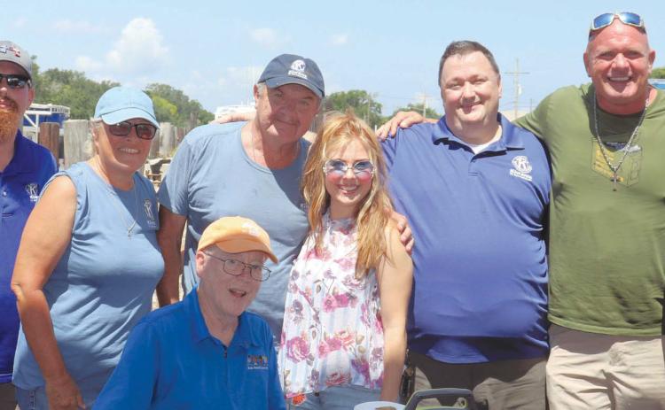 Nicholas Koepp, Beth Vincent, Michael Pechon (sitting), Barry Vincent, Amanda Shaw (Louisiana Music Hall of Fame inductee), Ellis Fortinberry, Ronnie Adams (of TV’s “Swamp People”), Brenda Peralta. Photo taken by Tony Peralta
