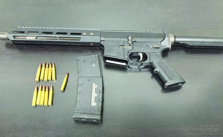 An Anderson AM-15 multi-caliber AR-style ri. e/pistol was recovered from the stolen vehicle Augustus was driving during the incident.