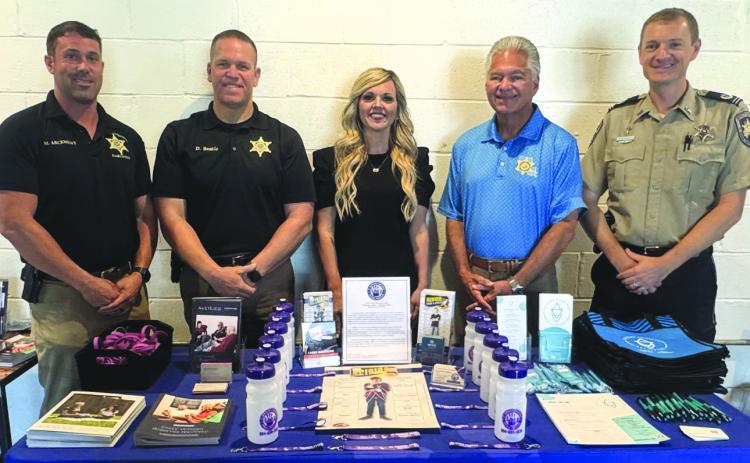 The St. Bernard Sheri's Oce recently took part in a special gathering hosted by the St. Bernard Taskforce Opioid Program to bring together residents, community partners and organizations in support of individuals on their journey to recovery. From left, are: Capt. Matthew Arcement, Col. Daniel Bostic Jr., commander of the Special Investigations Division, S.T.O.P. Program Director Katelin Neitzschman, Sheri James Pohlmann and Chaplain Aaron Johnson.