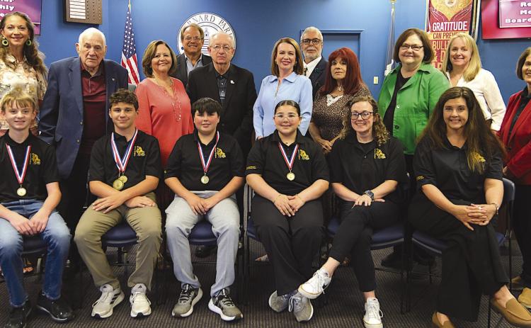 Elementary Division, 1st row from left: Dominick Shreve, Luke Gagnard, Grayson Caballero, Miriam Dali, Christina Crego, Melinda Hall; 2nd row from left: Millie Harris, Don Campbell, Diana Dysart, Joseph Long, Katherine Lemoine, Rosiland White, Doris Voitier, Carly Creason, Mary Lumetta; 3rd row: Sean Warner and Henry Rodriguez III.