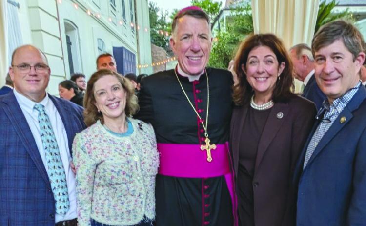 From left: Rep. Mike Bayham, Rep. Aimee Freeman, Archbishop James Checchio, Rep. Stephanie Berault, and Sen. Kirk Talbot.