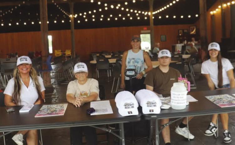 Volunteers help run Blues, Brews, and BBQ.