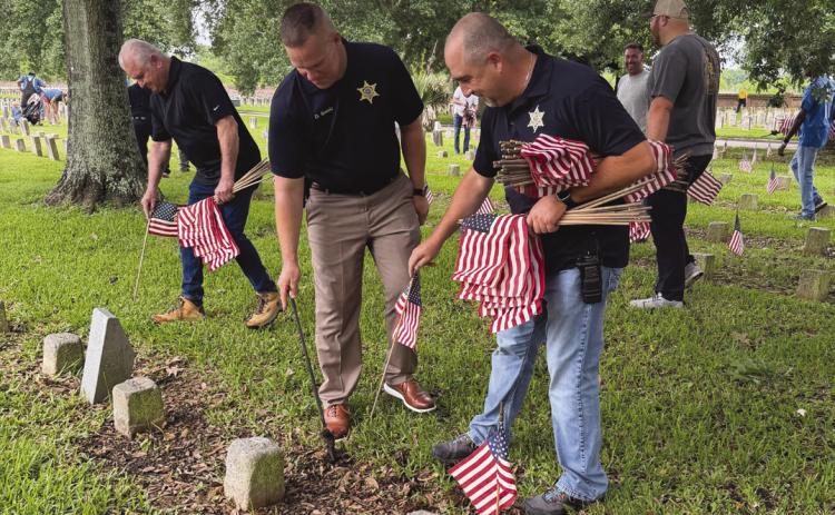 From left: SBSO Sgt. Stephen Imbraguglio, Col. Daniel Bostic Jr. and Dep. Jules Martin Jr.
