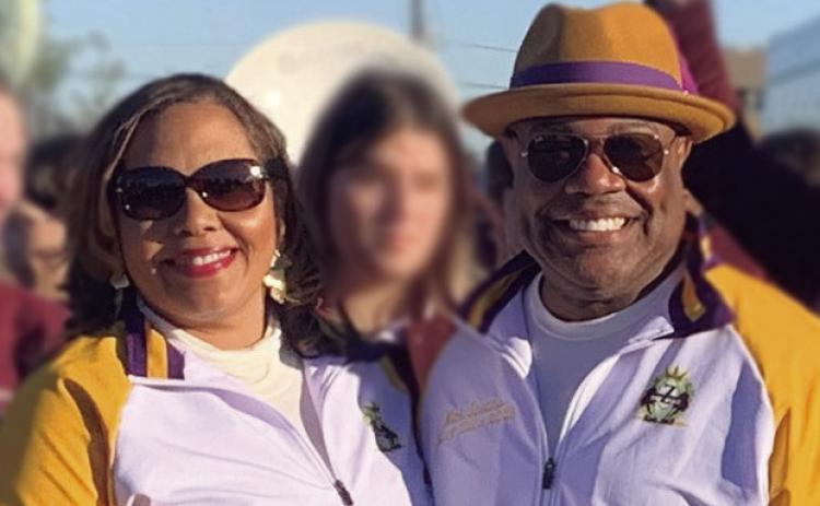 The 2023 King of Zulu, Nicholls 'Nick' Spears, and his Queen, Christy Spears, recently opened Carnival Season in Chalmette with a party at Torres Park. The event was followed by a second-line parade, led by Chalmette High School Band, to the couple's Arabi home where the Zulu flag was raised. Photo courtesy of Charles Jackson