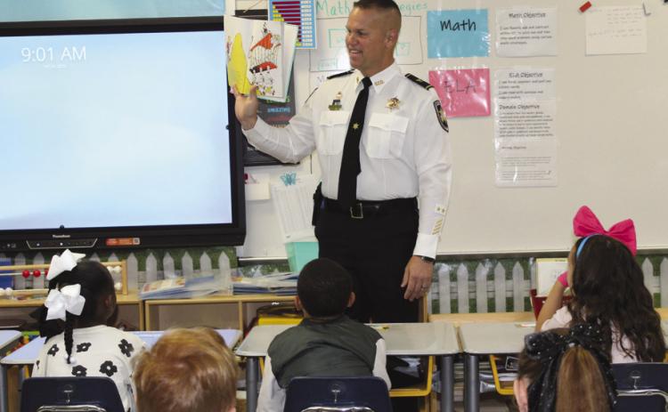 Col. Daniel Bostic Jr., commander of SBSO's Special Investigations Division, visited Joseph Davies Elementary this week to read to students during the school's Literacy Week festivities.
