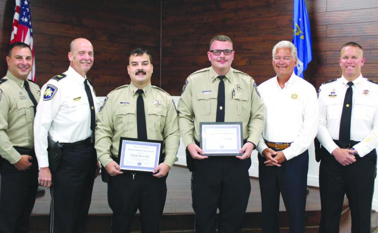 St. Bernard Sheri's Oce Dep. Trevor Lane and Dep. Chase Richard, both assigned to the Corrections Division at the St. Bernard Parish Prison, received Kiwanis Club of St. Bernard-Arabi Sammie Catalanotto LifeSaver Awards on Tuesday, July 8. At the ceremony are, from left: Lt. Justin Topey, of the Corrections Division; Col. Kevin Sensebe, commander of the Corrections Division; Dep. Lane, Dep. Richard, Sheri James Pohlmann; and Col. Daniel Bostic, commander of the Special Investigations Division.