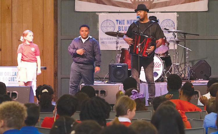 Bruce “Sunpie” Barnes plays the Blues for St. Bernard Parish Public School students.