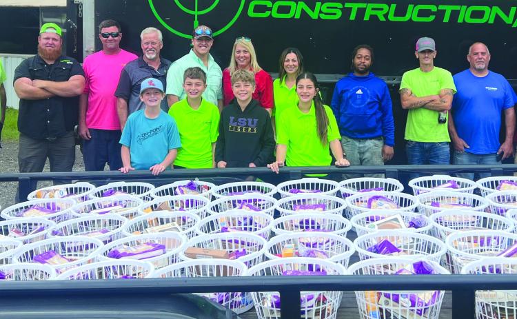 On Point Construction owners, employees and their children have been hand delivering Thanksgiving baskets throughout St. Bernard Parish to families in need for the past seven years.