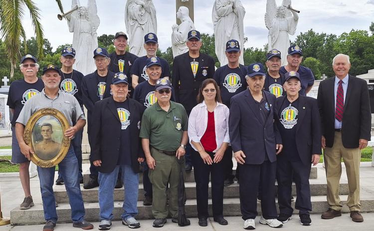 Members of Vietnam Veterans of America Chapter 550 and members of the Los Isleños held their annual Memorial Day Remembrance at St. Bernard Catholic Cemetery. American Flags were placed on all Veteran's grave sites.