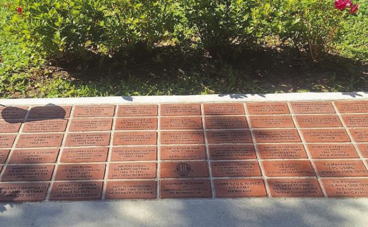 Commemorative bricks honoring the legacy and service and Vietnam War veterans.