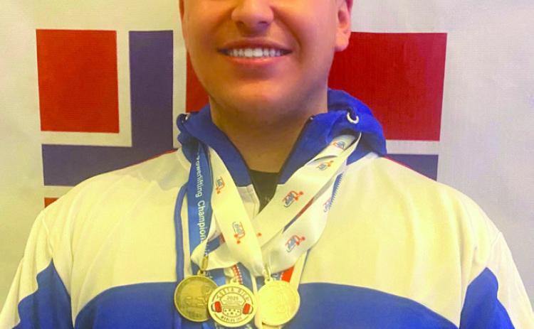 St. Bernard Native and Holy Cross Graduate Earns Silver at Powerlifting World Championships