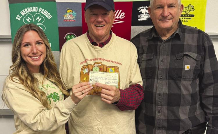 Pictured from left to right are St. Bernard Parish 4-HAgent Gabrielle Guerra, community supporter Michael Chutz, and St. Bernard Parish 4-H Agent Wayne Burgess.